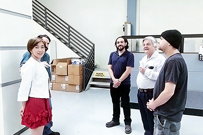 Liqpack Team with customers