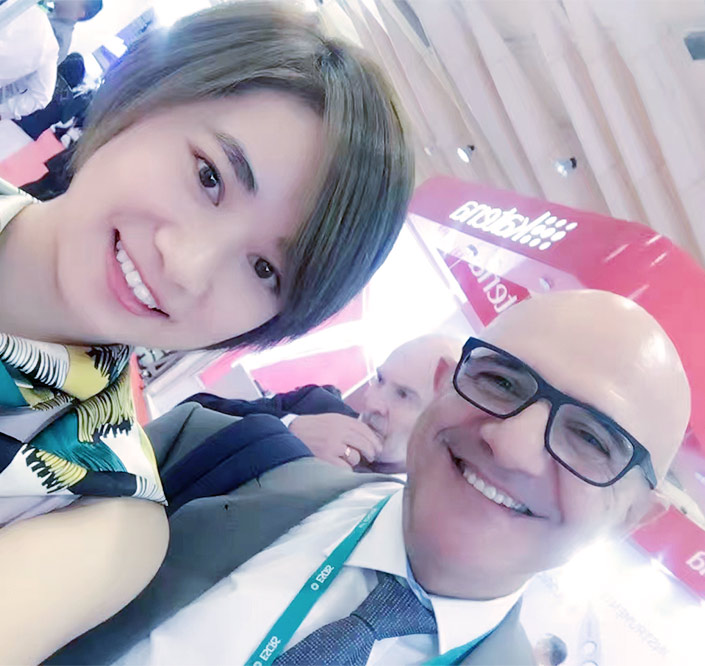 Liqpack sales women with customer