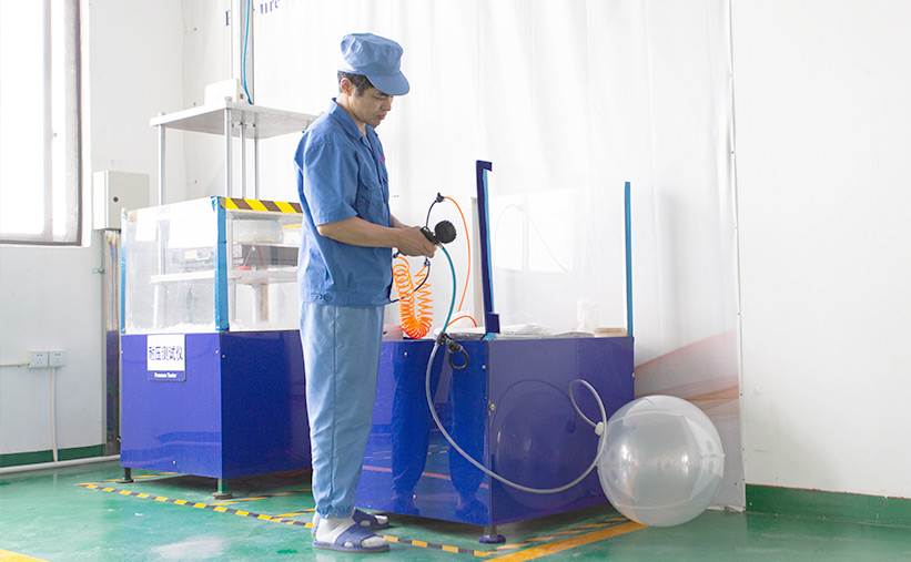 LIQPACK worker operating testing for flexible liquid packaging